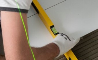 tiler-working-renovation-apartment_23-2149278627
